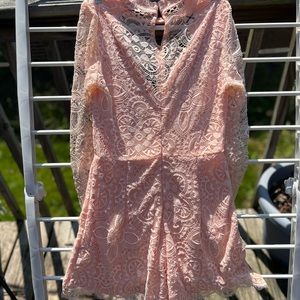 Very dressy romper size medium.